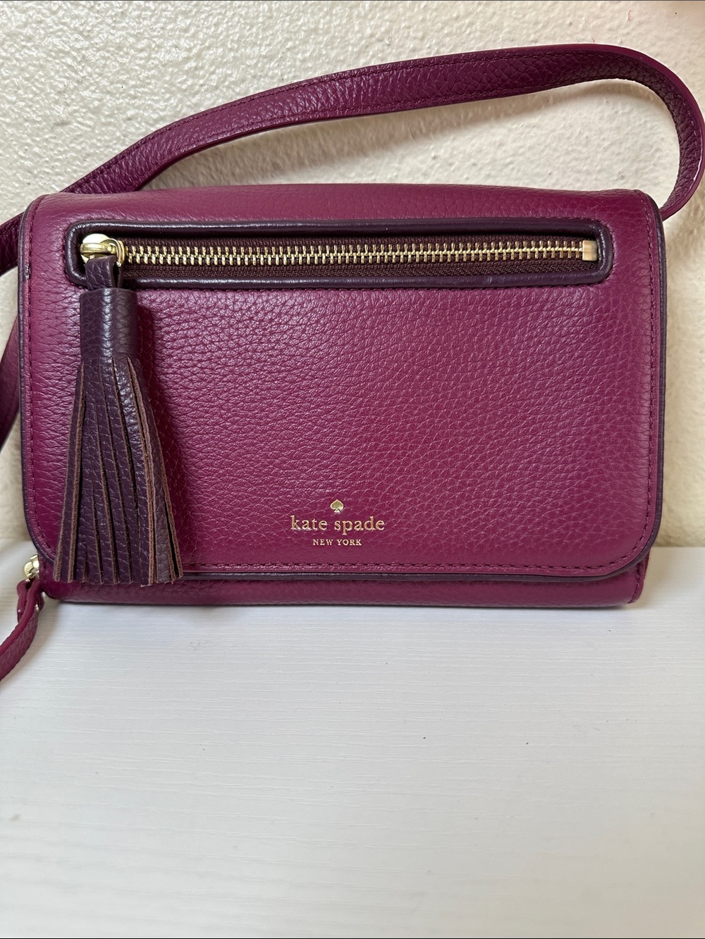 kate spade Plum Leather Wallet Crossbody with Tassel and Gold Hardware